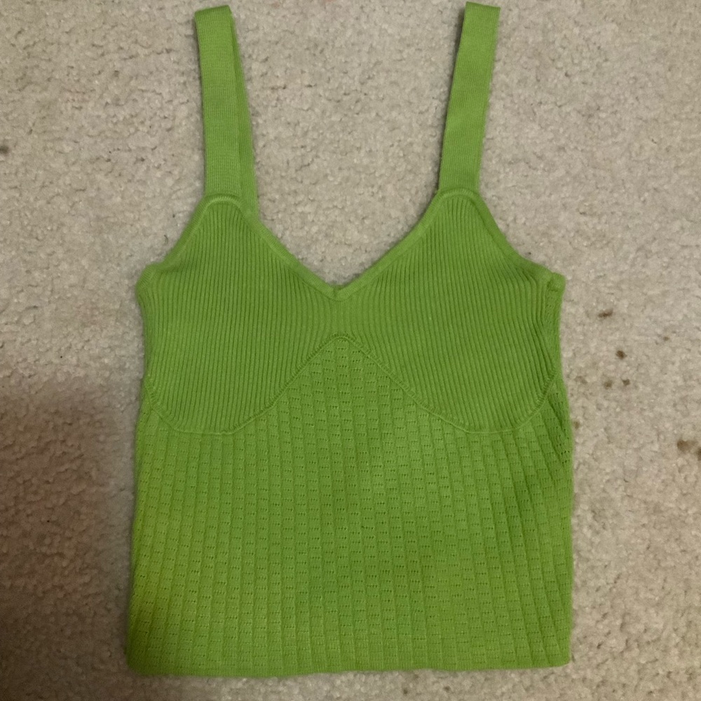 green knitted tank top
